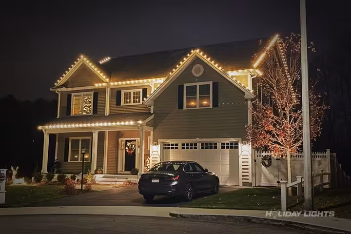 Professional roofline Christmas decoration with C9 LED lights for residential properties